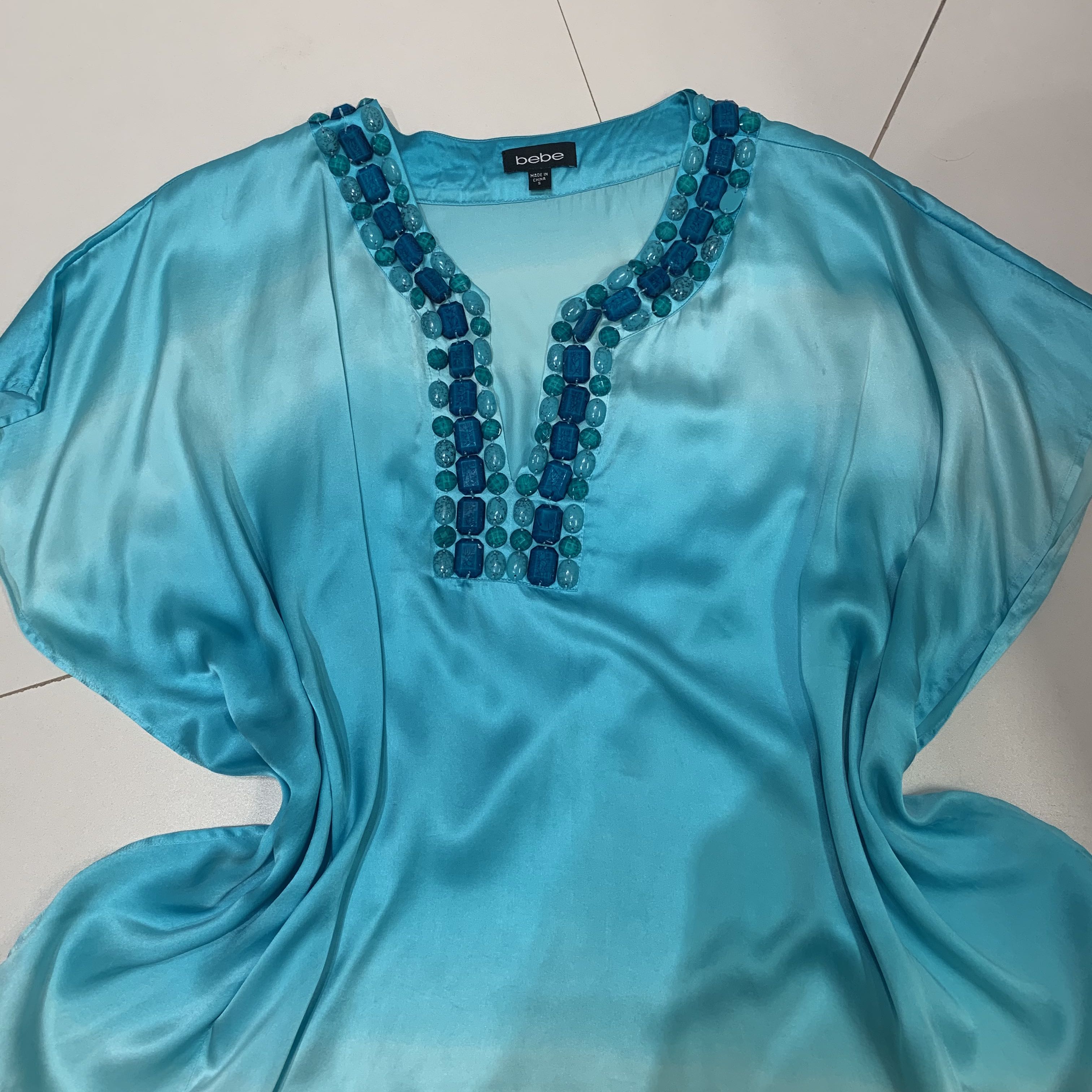 חולצה מהממת של חברת ביבי במצב חדש לאחר ניקוי יבש מידה s/m