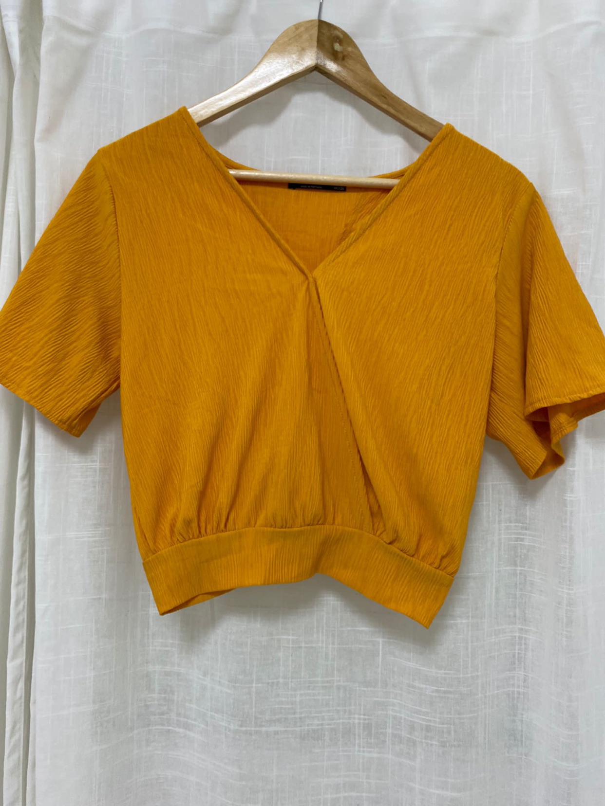 טופ עם קשירה אחורית
מידה S