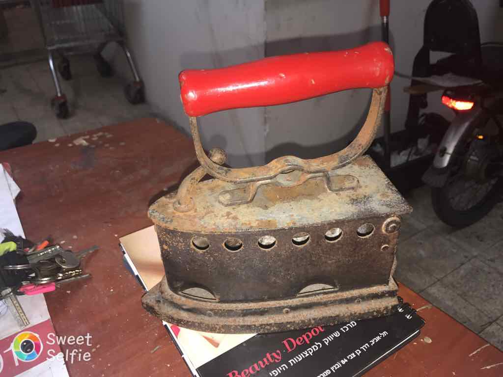 מגהץ פחם 1000₪