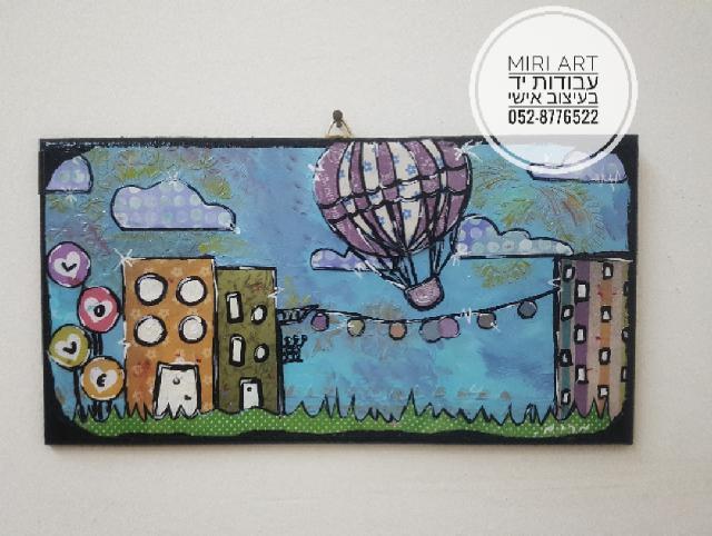 ציור על עץ בעבודת יד