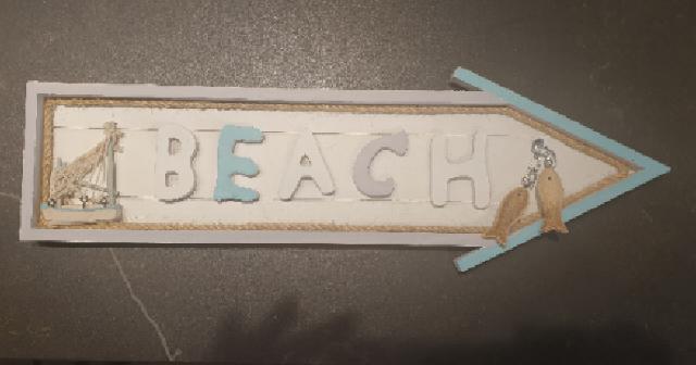 שלט מעוצב לבית