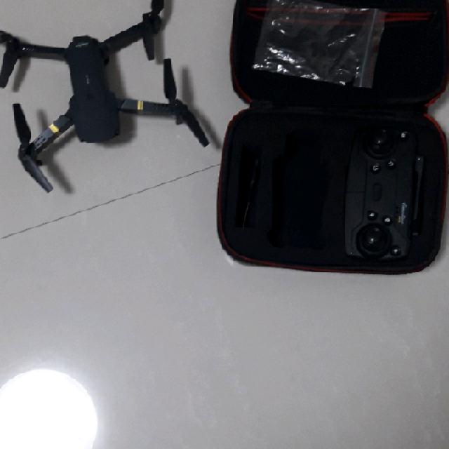 רחפן עם שתי בטריות  תיק שלט מיקצועי מיתחבר לפלאפון